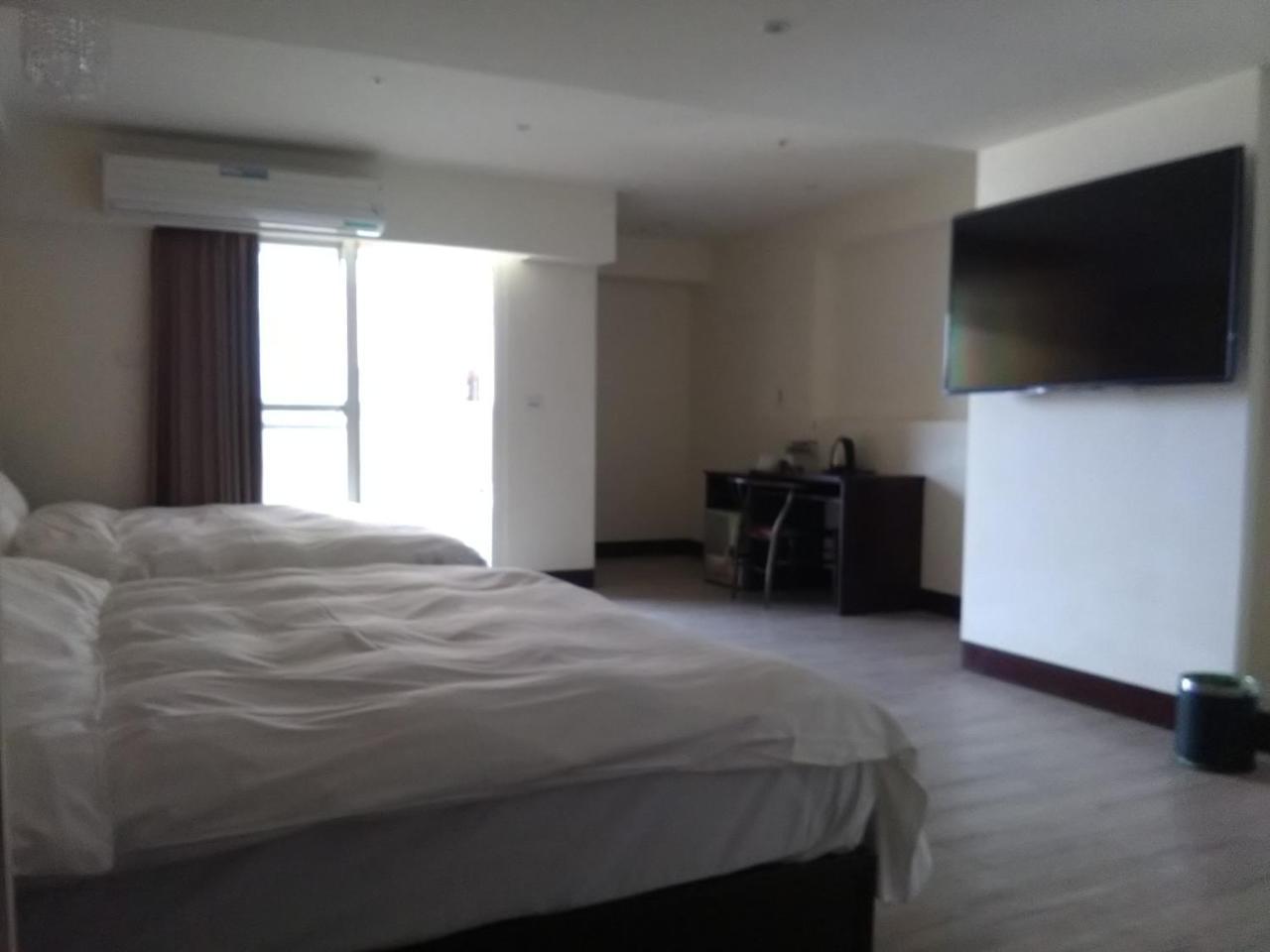 Dengfeng Milan Business Hotel Huwei Екстер'єр фото